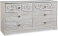 Elevate Your Bedroom with the Signature Design by Ashley Paxberry Boho Dresser in Chic Whitewash Finish